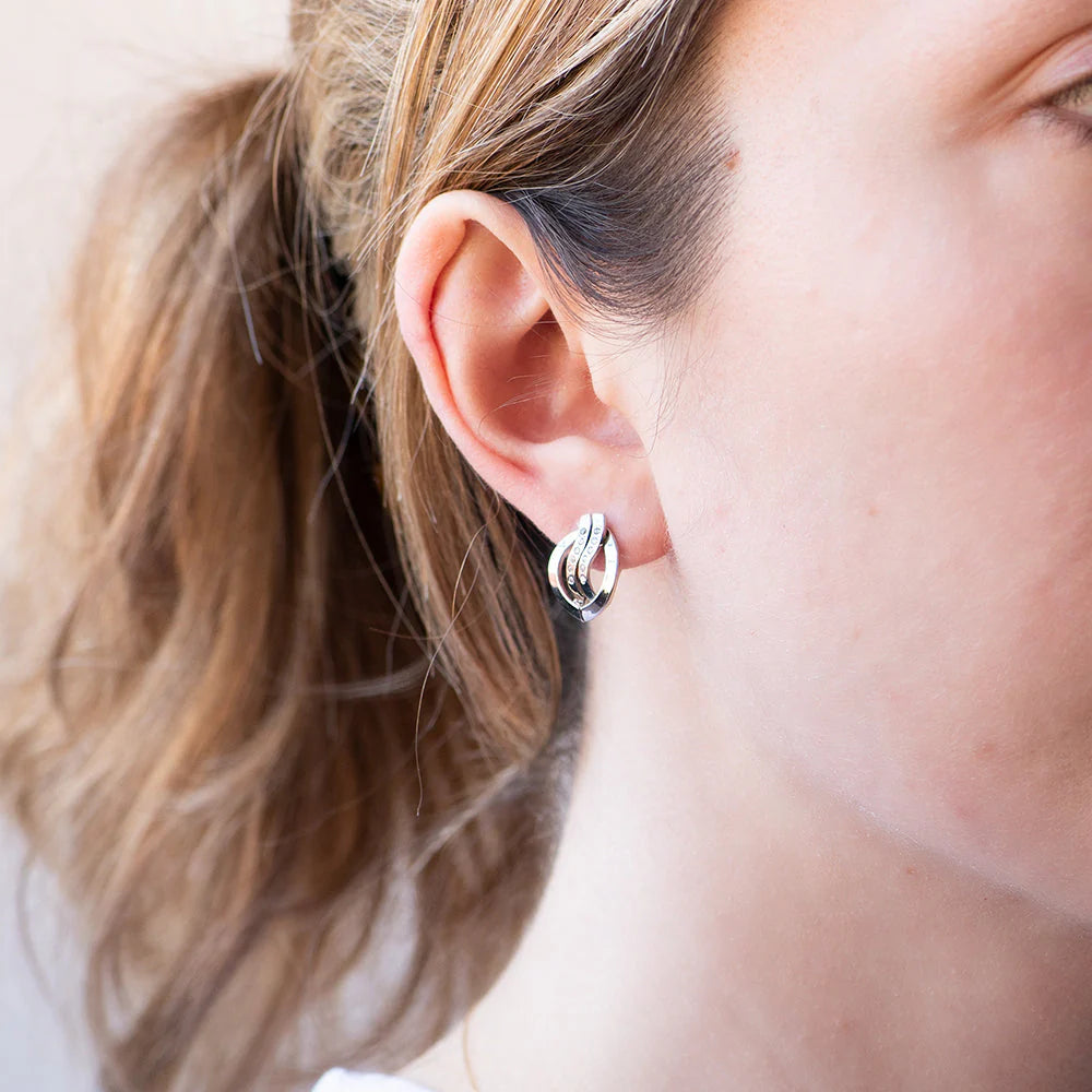 Aretes Ondas de Oro 9K con Circonitas