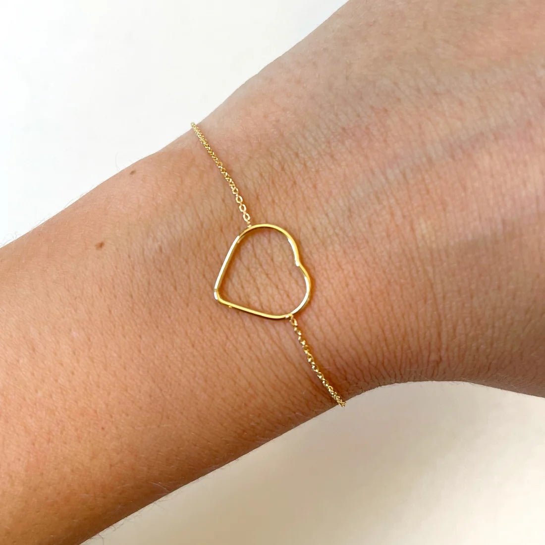 Pulsera silueta corazón Oro
