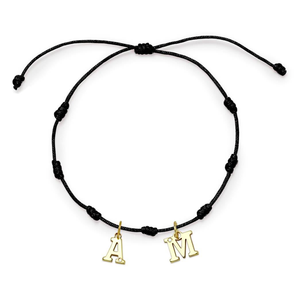 Pulsera con Inicial 7 nudos Negro 2 letras con Diamante y Oro