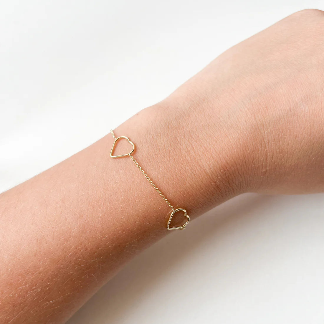 Pulsera 3 siluetas corazón Oro