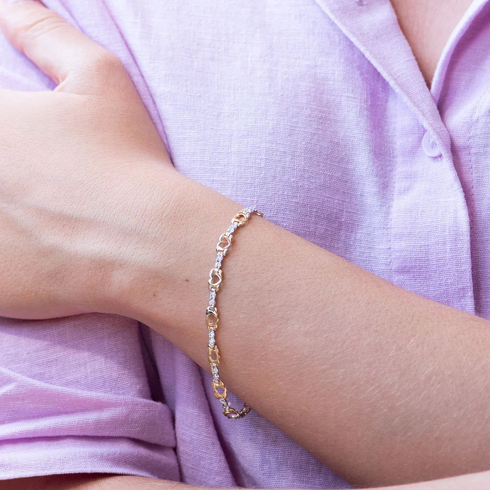 Pulsera Semirígida Corazones con Circonitas Oro Bicolor