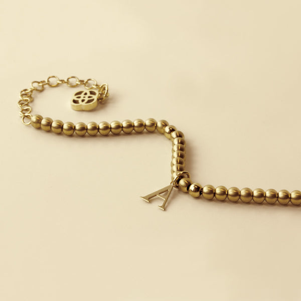 Pulsera con inicial Acero Doré Vintage