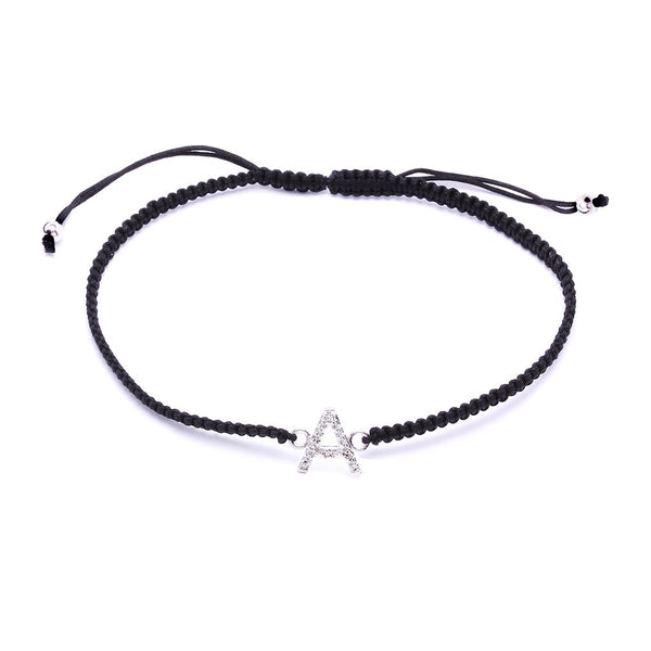 Pulsera con inicial en oro y diamantes